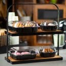 Tablecraft 10718 2 Tier Display Stand - 17 3/10"L x 8"W x 18"H, Acacia Wood/Black Metal Frame thumbnail 5