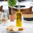 Tablecraft 916 16 oz Cruet w/ Stainless Steel Pourer - Glass, Green Tint thumbnail 5