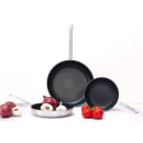Winco AFP-7NS-H 7" Non Stick Aluminum Frying Pan w/ Solid Silicone Handle thumbnail 2
