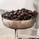 Vollrath 6432420 4 oz Round Perforated Spoodle - Black Nylon Handle, Heavy-Duty, Stainless Steel thumbnail 6