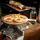 Tablecraft 11184 12" Round Serving Paddle - Melamine, Olive Wood thumbnail 6