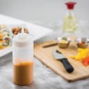 Tablecraft 11663C 16 oz Squeeze Bottle w/ Natural Cone Tip, Polyethylene, Clear thumbnail 4