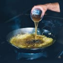 Matfer Bourgeat 062051 14 1/8" Black Steel Paella Pan w/ Curved Sides thumbnail 5