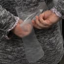 LK Packaging Disposable Embossed Poly Apron - 28" x 46", Clear (AP10F2846N) thumbnail 3